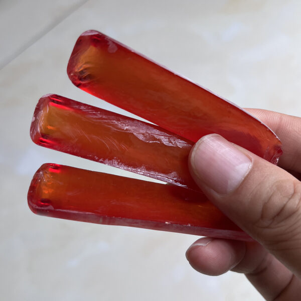 synthetic orange sapphire rough